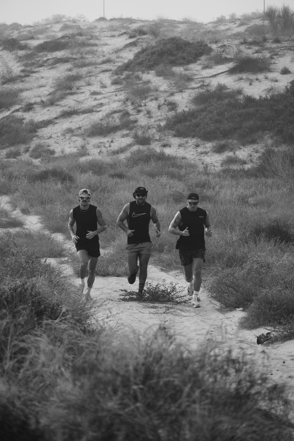 Robbie and two mates running a desert trail together